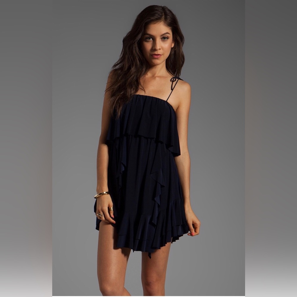 Asymmetrical dress with ruffled detailing